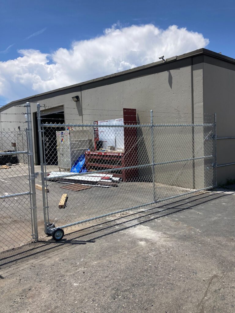 secure chain link fence to ground 